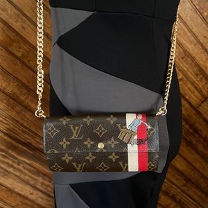 Authentic- Louis Vuitton Bellboy Groom Sarah monogram wallet limited edition (C)
